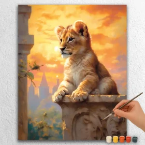 Bébé Lion au Coucher de Soleil
